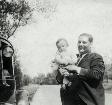 Image of OLP holding son